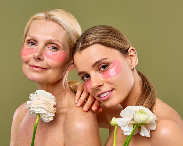 Skincare with undereye patches, flowers, cosmetics, bonding, hydration, relaxation, wellness